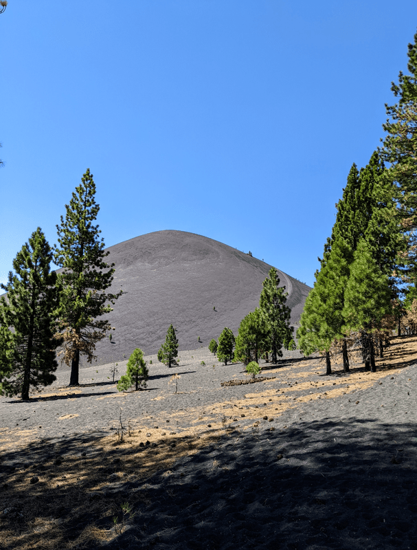 Photo of Cinder Cone, a flat cone shaped volcano