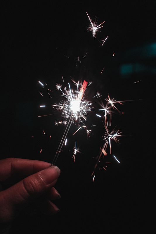 Close up of person holding firecracker